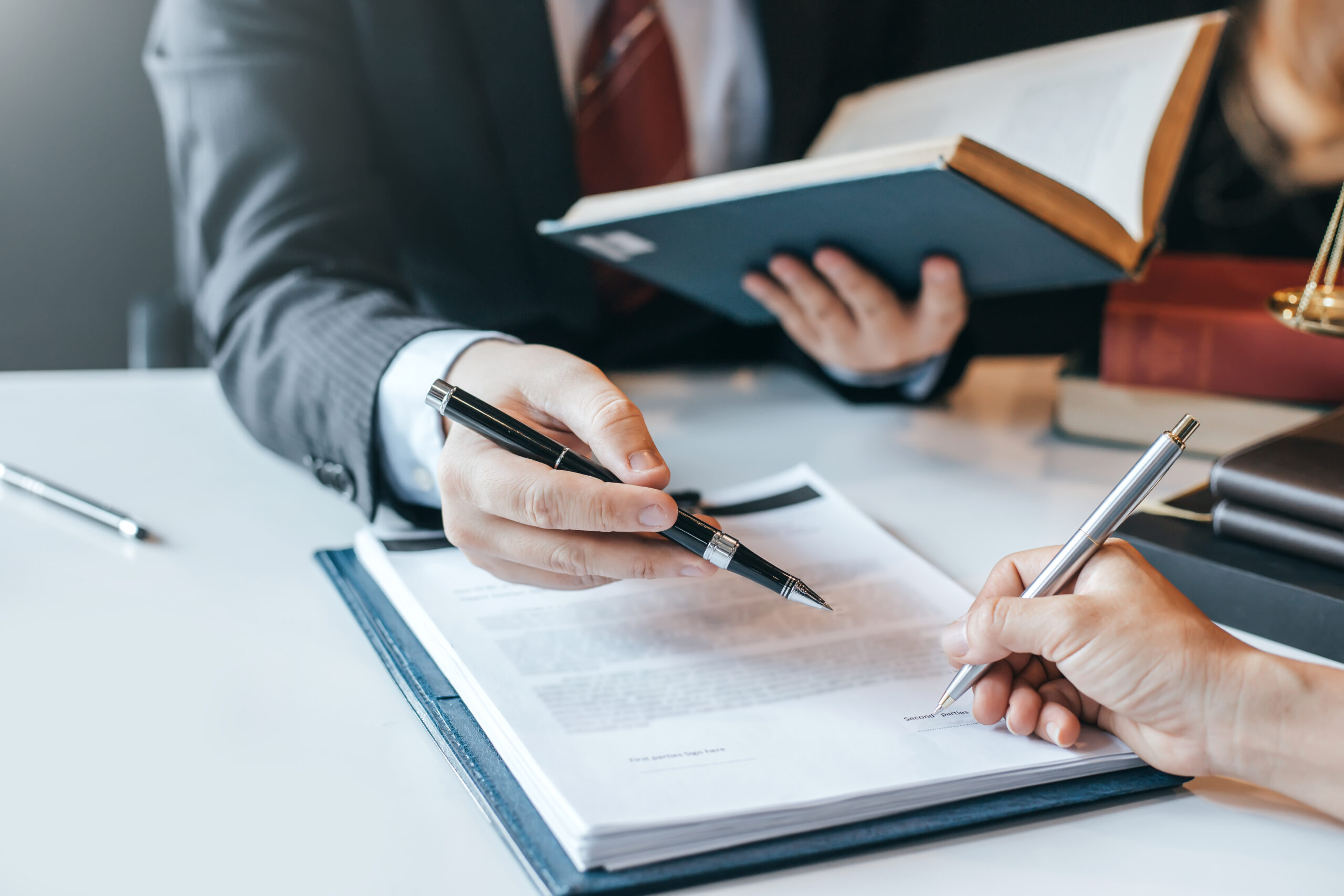 Attorney Reviewing Legal Documents with a Client During the Expungement Process